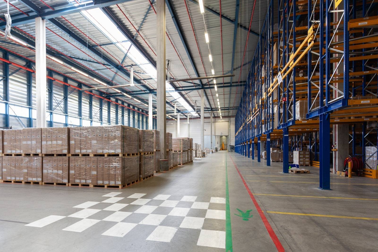Clean gray epoxy flooring in a Melbourne warehouse